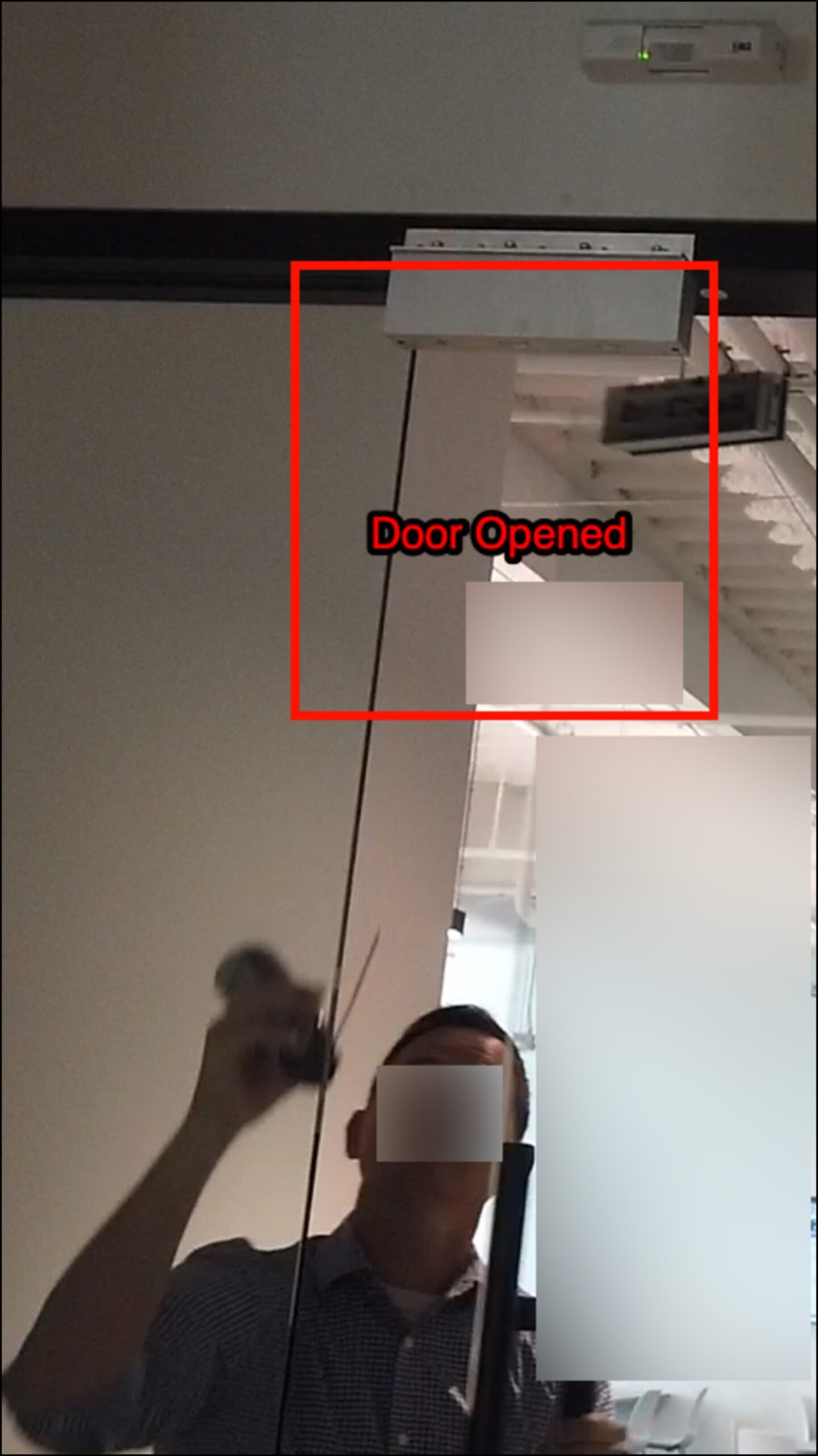 Door standing open after the REX sensor bypass, providing unchallenged access to the interior office area